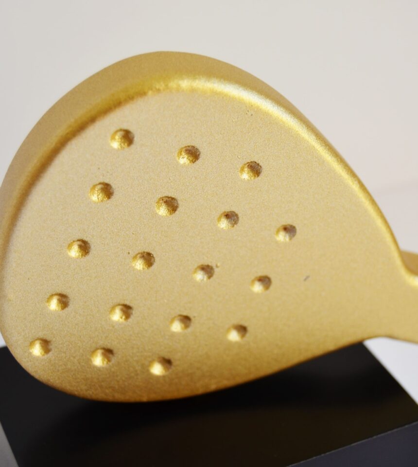 Padel resina dorada